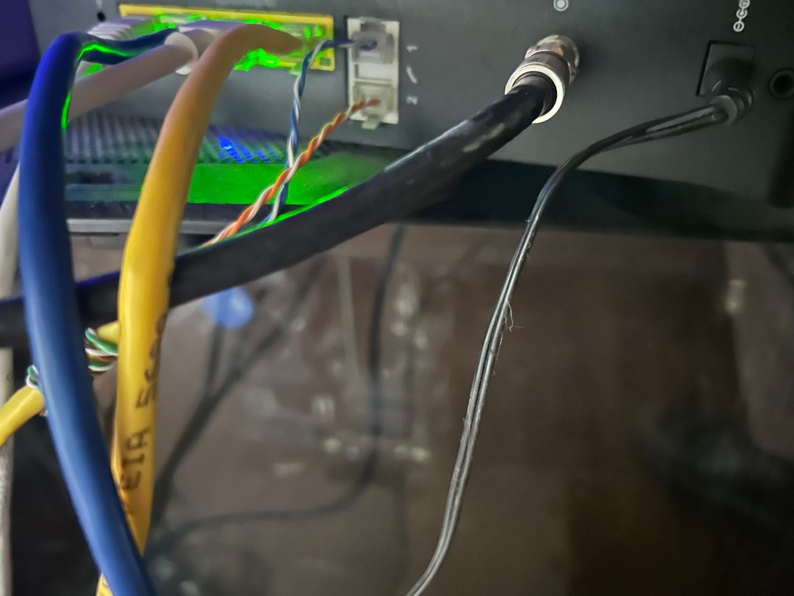 Security system wiring connected to a recorder